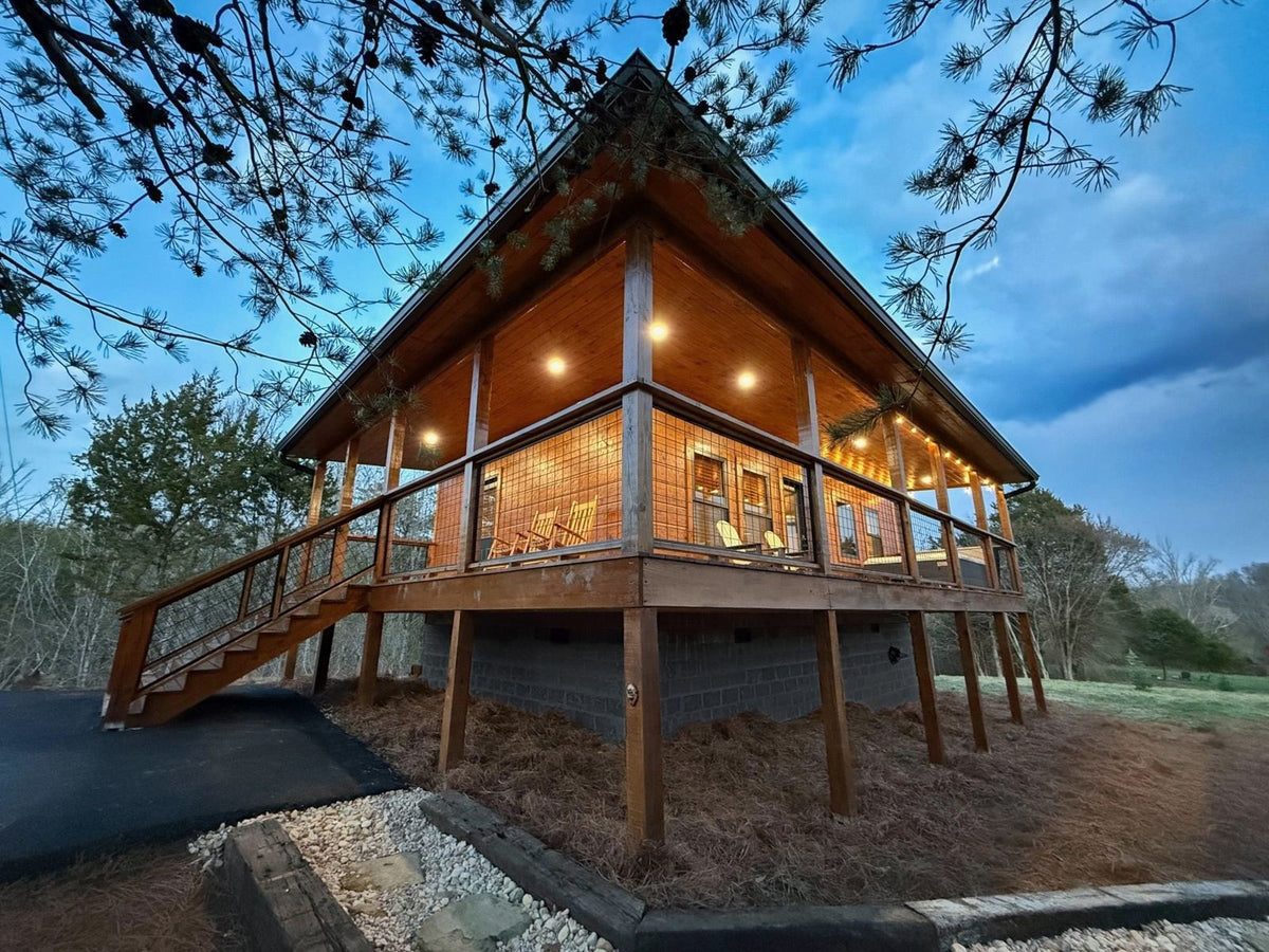20x30 porch cabin at dusk